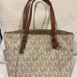 MK Purse. Used condition a few pen marks inside. Non smoking no pet home